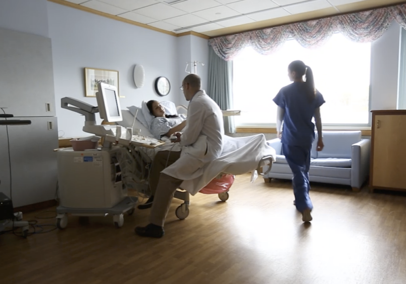 doctor and nurse in patient's room